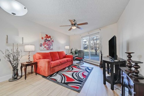 112-380 Marina Drive, Chestermere, AB - Indoor Photo Showing Living Room