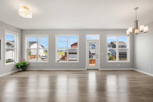 212 Magnolia Heath Se, Calgary, AB - Indoor Photo Showing Living Room