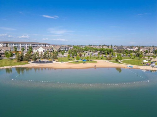 212 Magnolia Heath Se, Calgary, AB - Outdoor With Body Of Water With View