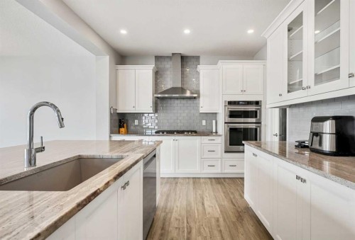 212 Magnolia Heath Se, Calgary, AB - Indoor Photo Showing Kitchen With Upgraded Kitchen
