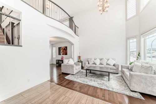 388 Kinniburgh Boulevard, Chestermere, AB - Indoor Photo Showing Living Room
