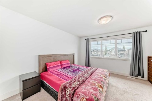 388 Kinniburgh Boulevard, Chestermere, AB - Indoor Photo Showing Bedroom