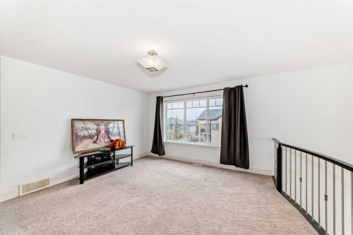 388 Kinniburgh Boulevard, Chestermere, AB - Indoor Photo Showing Other Room