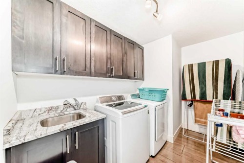 388 Kinniburgh Boulevard, Chestermere, AB - Indoor Photo Showing Laundry Room