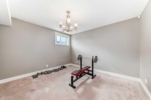 388 Kinniburgh Boulevard, Chestermere, AB - Indoor Photo Showing Gym Room
