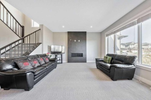 82 Panton View Nw, Calgary, AB - Indoor Photo Showing Living Room With Fireplace