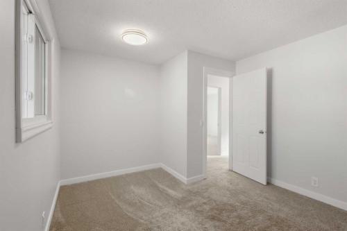 327 Abalone Place Ne, Calgary, AB - Indoor Photo Showing Other Room