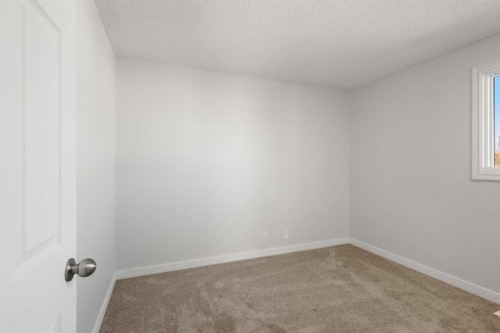 327 Abalone Place Ne, Calgary, AB - Indoor Photo Showing Other Room