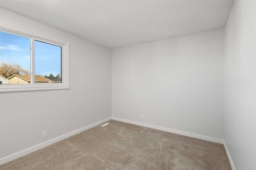 327 Abalone Place Ne, Calgary, AB - Indoor Photo Showing Other Room