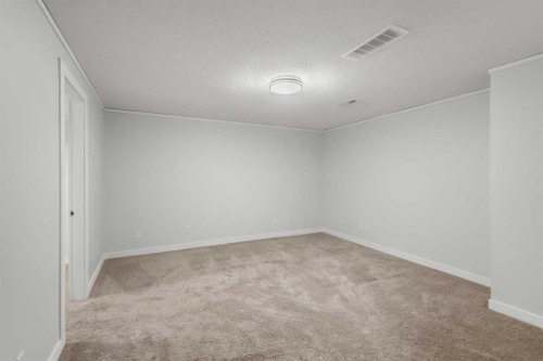 327 Abalone Place Ne, Calgary, AB - Indoor Photo Showing Other Room
