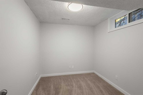 327 Abalone Place Ne, Calgary, AB - Indoor Photo Showing Other Room
