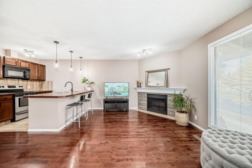 8432 Berkley Road Nw, Calgary, AB - Indoor With Fireplace
