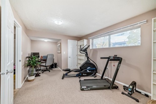 8432 Berkley Road Nw, Calgary, AB - Indoor Photo Showing Gym Room