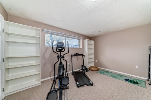 8432 Berkley Road Nw, Calgary, AB - Indoor Photo Showing Gym Room