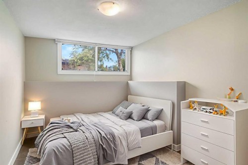 1123 Mckinnon Drive Ne, Calgary, AB - Indoor Photo Showing Bedroom