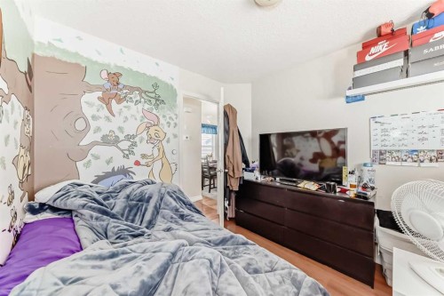144 Taradale Drive Ne, Calgary, AB - Indoor Photo Showing Bedroom