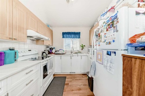 144 Taradale Drive Ne, Calgary, AB - Indoor Photo Showing Kitchen