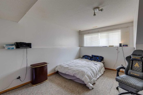 1656 Strathcona Gate, Strathmore, AB - Indoor Photo Showing Bedroom