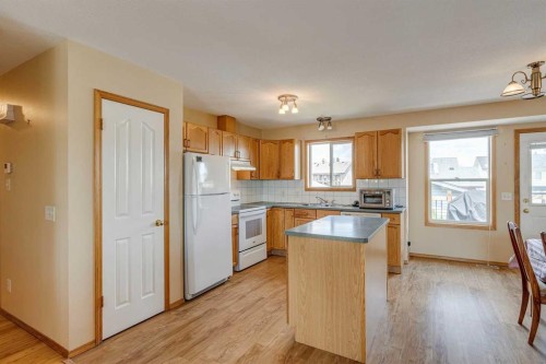 1656 Strathcona Gate, Strathmore, AB - Indoor Photo Showing Kitchen With Double Sink