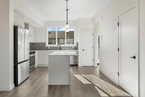215 Belvedere Avenue Se, Calgary, AB - Indoor Photo Showing Kitchen With Upgraded Kitchen