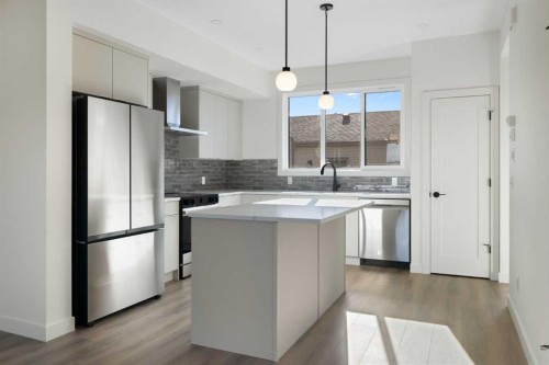 215 Belvedere Avenue Se, Calgary, AB - Indoor Photo Showing Kitchen With Upgraded Kitchen