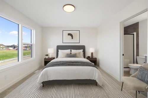 215 Belvedere Avenue Se, Calgary, AB - Indoor Photo Showing Bedroom