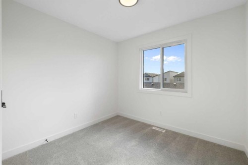 215 Belvedere Avenue Se, Calgary, AB - Indoor Photo Showing Other Room