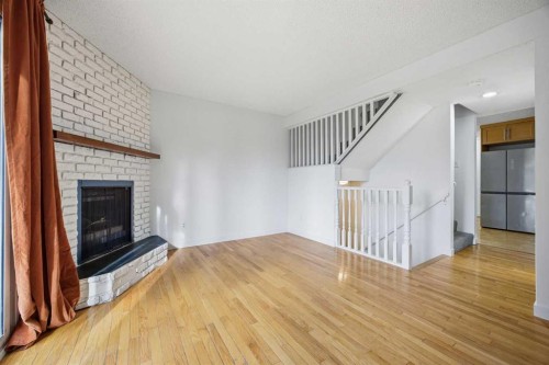 8-803 Varsity Estates Drive Nw, Calgary, AB - Indoor With Fireplace