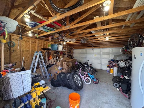 27 Hidden Valley Link Nw, Calgary, AB - Indoor Photo Showing Garage