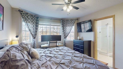 27 Hidden Valley Link Nw, Calgary, AB - Indoor Photo Showing Bedroom