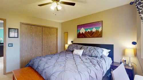 27 Hidden Valley Link Nw, Calgary, AB - Indoor Photo Showing Bedroom