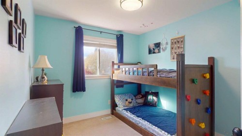 27 Hidden Valley Link Nw, Calgary, AB - Indoor Photo Showing Bedroom