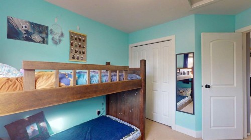 27 Hidden Valley Link Nw, Calgary, AB - Indoor Photo Showing Bedroom