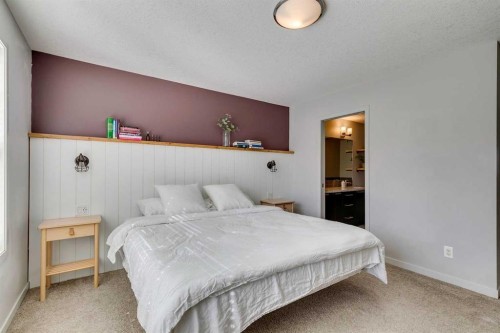 144 Masters Link Se, Calgary, AB - Indoor Photo Showing Bedroom