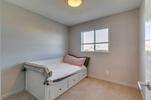 144 Masters Link Se, Calgary, AB - Indoor Photo Showing Bedroom