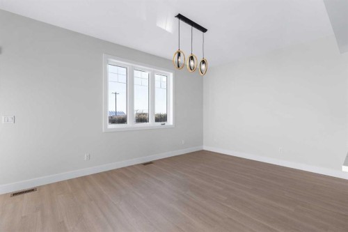 1907 Mccaskill Drive, Crossfield, AB - Indoor Photo Showing Other Room