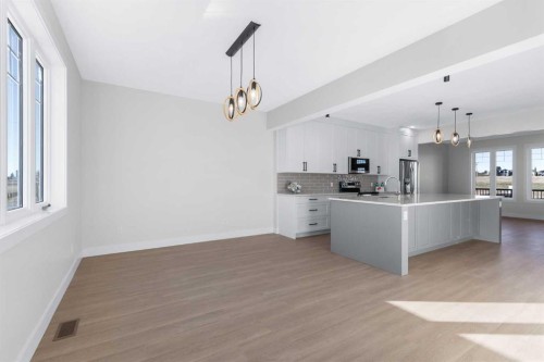 1907 Mccaskill Drive, Crossfield, AB - Indoor Photo Showing Kitchen With Upgraded Kitchen