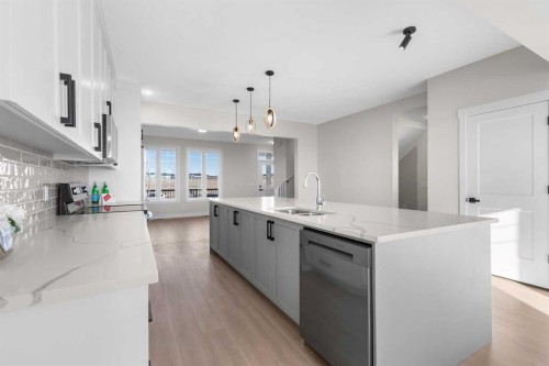 1907 Mccaskill Drive, Crossfield, AB - Indoor Photo Showing Kitchen With Double Sink