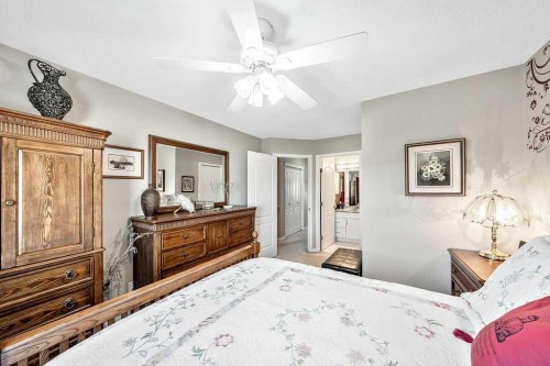 143 Country Hills Gardens Nw, Calgary, AB - Indoor Photo Showing Bedroom