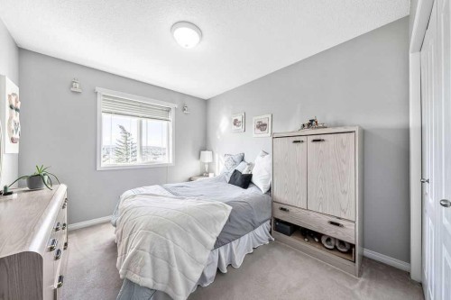 143 Country Hills Gardens Nw, Calgary, AB - Indoor Photo Showing Bedroom
