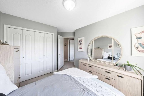 143 Country Hills Gardens Nw, Calgary, AB - Indoor Photo Showing Bedroom