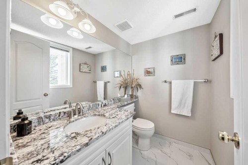 143 Country Hills Gardens Nw, Calgary, AB - Indoor Photo Showing Bathroom