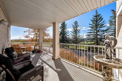 143 Country Hills Gardens Nw, Calgary, AB - Outdoor With Deck Patio Veranda With Exterior