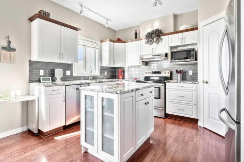143 Country Hills Gardens Nw, Calgary, AB - Indoor Photo Showing Kitchen With Upgraded Kitchen
