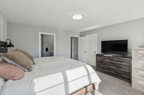 504 Creekrun Lane Sw, Airdrie, AB - Indoor Photo Showing Bedroom