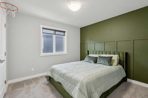 504 Creekrun Lane Sw, Airdrie, AB - Indoor Photo Showing Bedroom