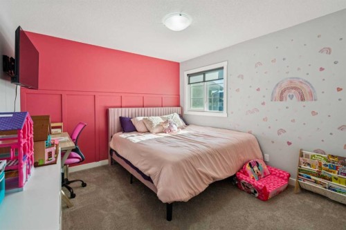 504 Creekrun Lane Sw, Airdrie, AB - Indoor Photo Showing Bedroom