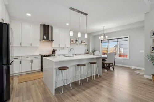 504 Creekrun Lane Sw, Airdrie, AB - Indoor Photo Showing Kitchen With Upgraded Kitchen