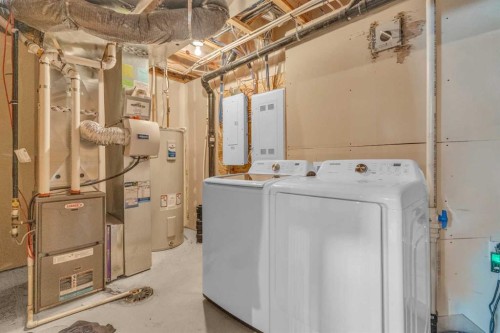 93 Copperstone Common Se, Calgary, AB - Indoor Photo Showing Laundry Room
