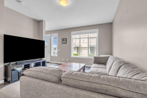 93 Copperstone Common Se, Calgary, AB - Indoor Photo Showing Living Room